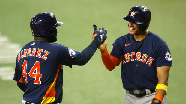 Sep 5, 2023; Arlington, Texas, USA;Houston Astros designated hitter Yordan Alvarez (44) and shortstop Jeremy Pena (3) celebrate a two run home run in the seventh inning against the Texas Rangers at Globe Life Field. Mandatory Credit: Tim Heitman-USA TODAY Sports  